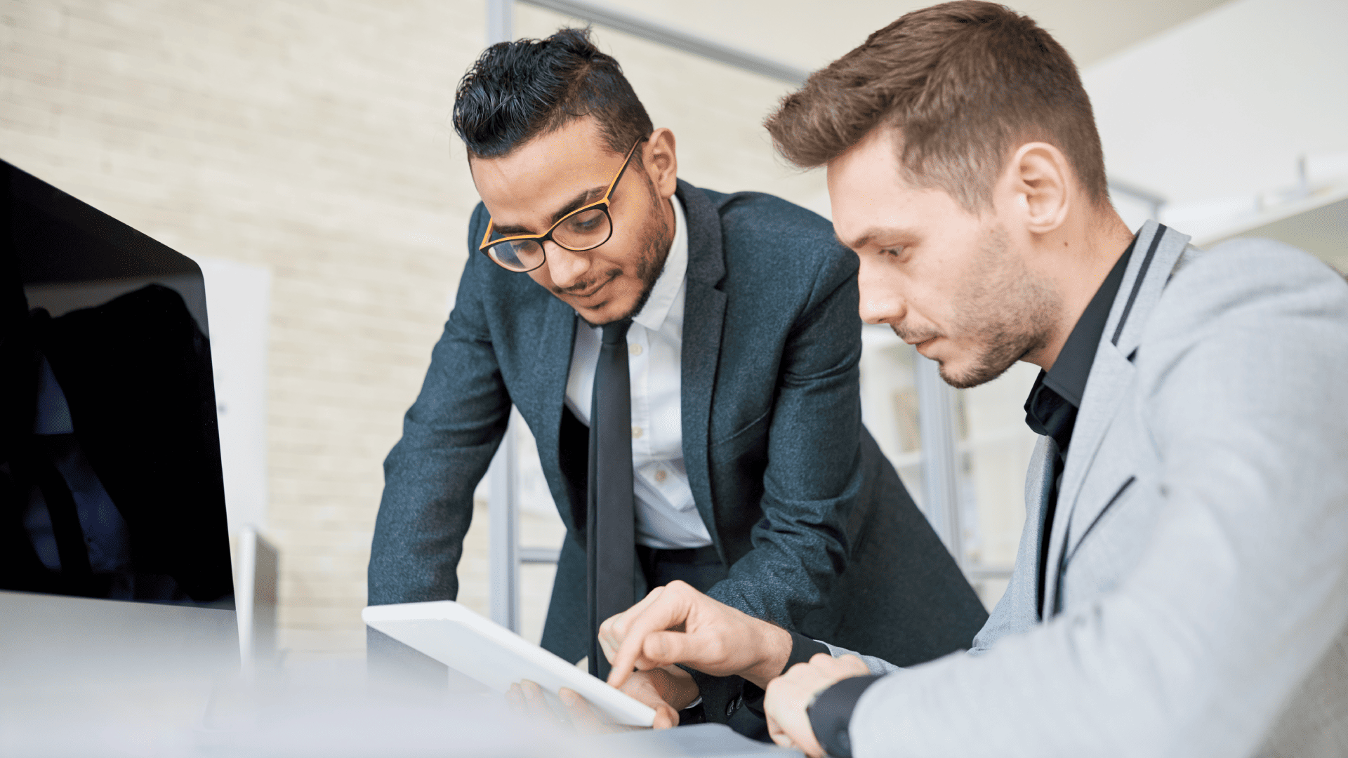 Two men are talking to each other